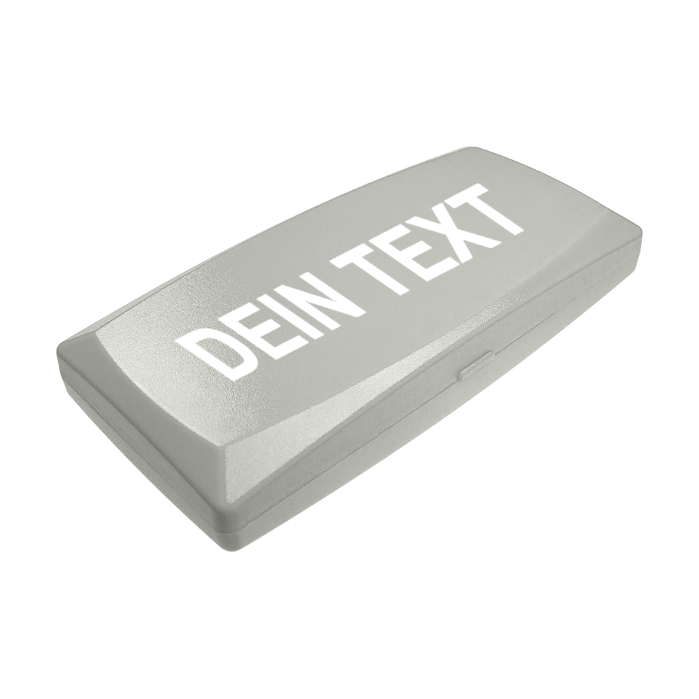 ABS-doos met eigen bedrukking Auf dem Bild ist eine graue Kunststoffbox zu sehen. Auf dem Deckel steht in großen weißen Buchstaben "DEIN TEXT".