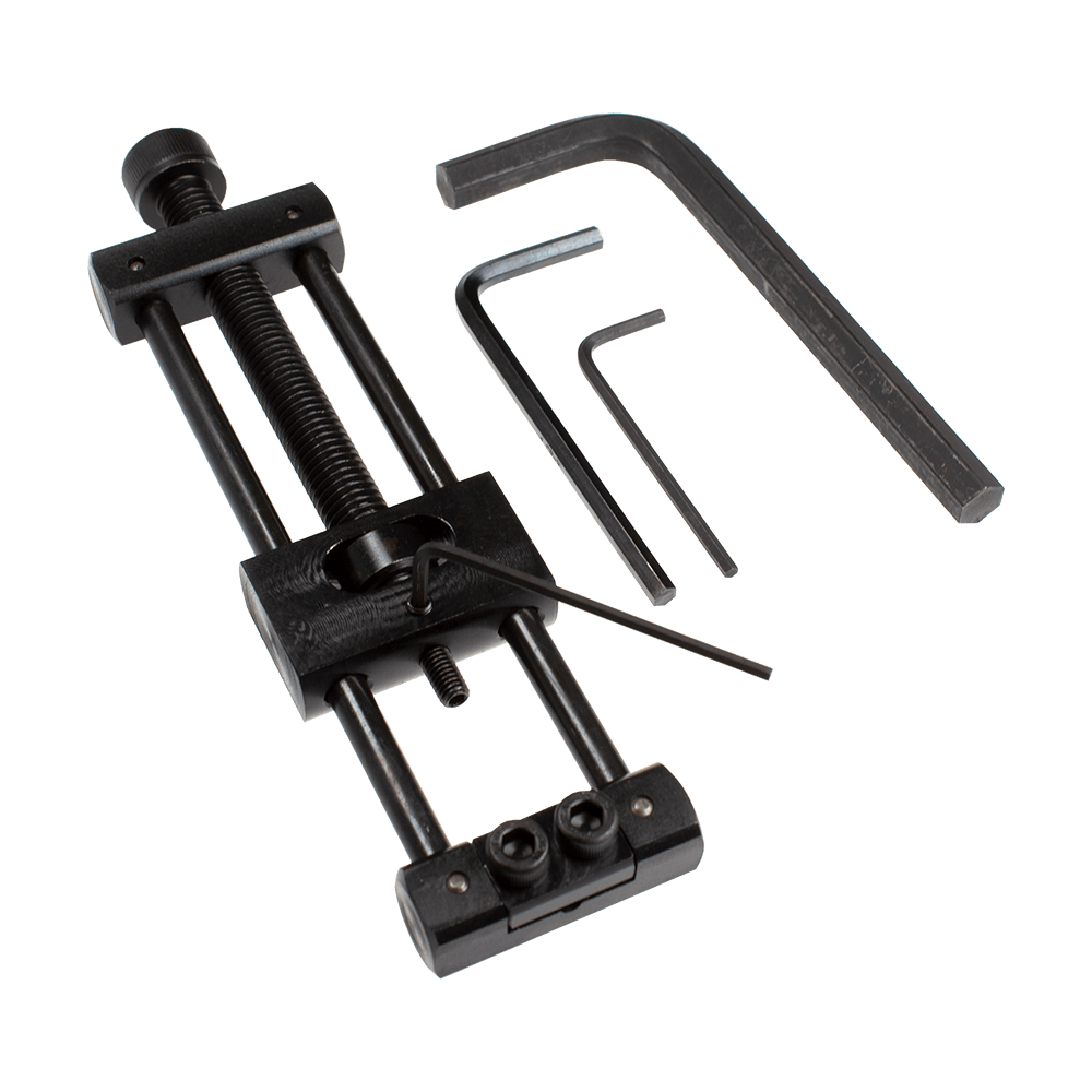 Designa Dart Repointer Black Pro Edition - Tipwisselaar Dieses Bild zeigt den Designa Dart Repointer Black Pro Edition - Spitzenwechsler. Es handelt sich um ein Werkzeug zum Austausch von Dartspitzen in schwarzem Design.