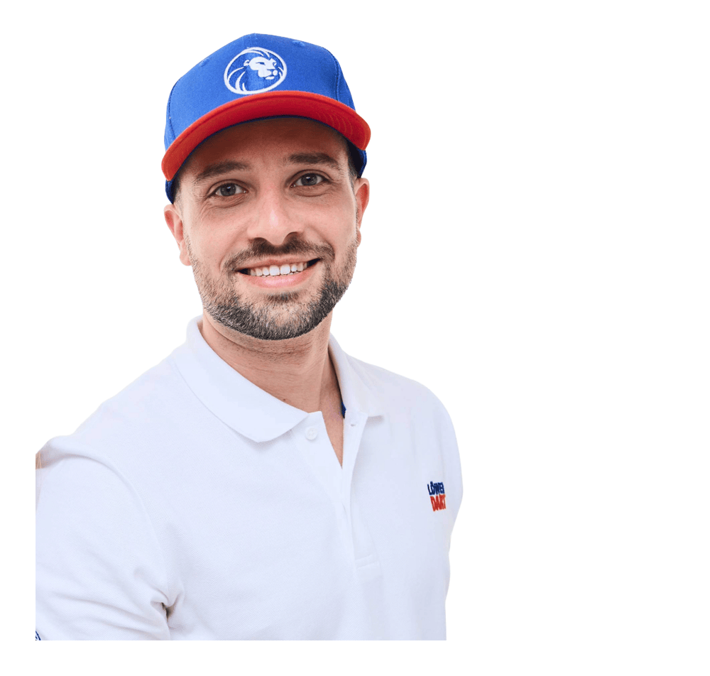 Lion Collection Cap Die Abbildung zeigt eine Cap aus der Löwen Kollektion. Die Cap ist ein beliebtes Accessoire für Dartspieler.