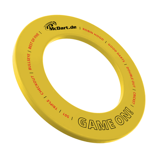 McDart-spel op dartbordomlijsting Das Bild zeigt das Produkt MSF-B4_McDart_Game_On_Dartboard_Surround_Gelb_1. Es handelt sich vermutlich um einen gelben Dartboard Surround mit der Aufschrift 'Game On'.