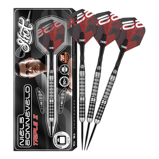 Shot van Niels Zonneveld V2 stalen darts Das Bild zeigt das Produkt "Shot Niels Zonneveld V2 Steeldarts" samt Verpackung und vier Steeldarts. Die Darts haben ein silber-schwarzes Design mit roten Flights.