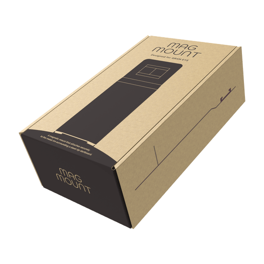 GranDarts Gran Eye Mag Mount-bevestiging Die Abbildung zeigt eine Verpackung des Produkts "GranDarts GranEye Mag Mount Befestigung". Die Schachtel ist aus braunem Karton und trägt die Aufschrift "Mag Mount".