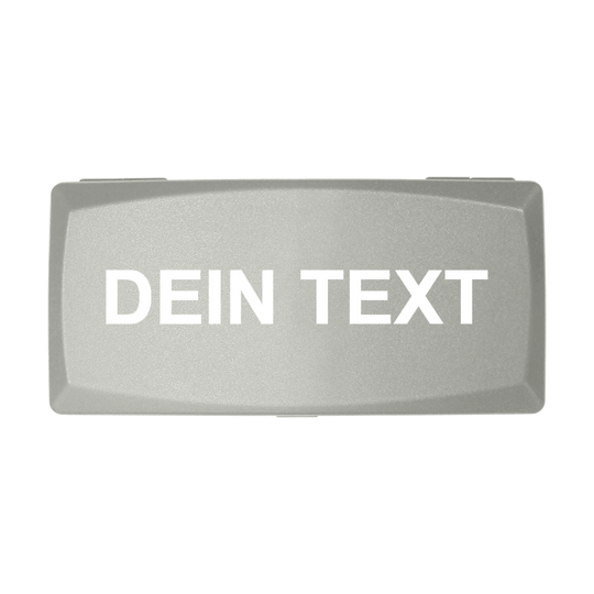 ABS-doos met eigen bedrukking Auf dem Bild ist eine graue Box zu sehen. Auf der Box steht in weißen Buchstaben "DEIN TEXT".