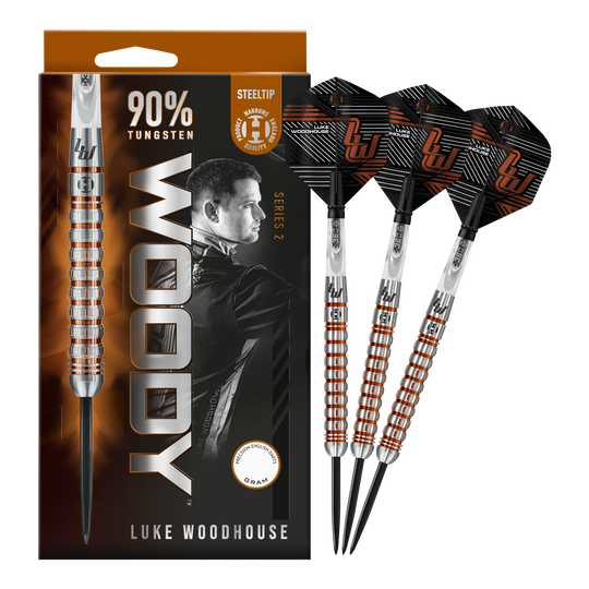 Auf dem Bild sind die Harrows Luke Woodhouse Series 2 Steeldarts zu sehen. Die Verpackung zeigt das Dart-Design sowie ein Porträt von Luke Woodhouse und die Aufschrift "90% Tungsten".